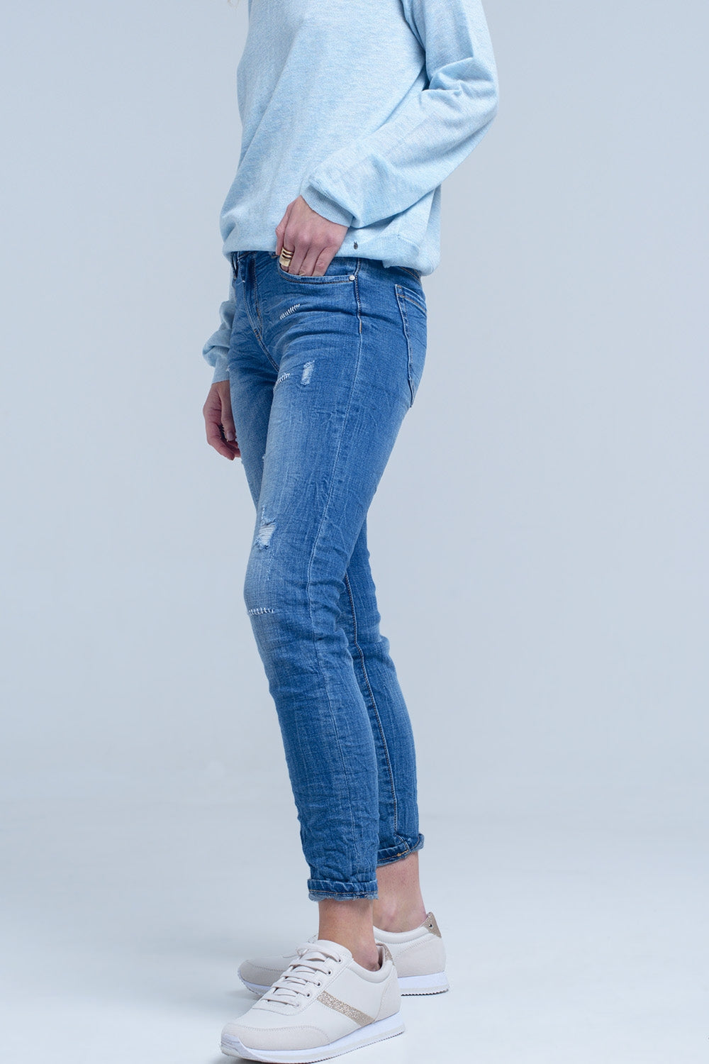 Ankle jeans with rip and repair - Jeans