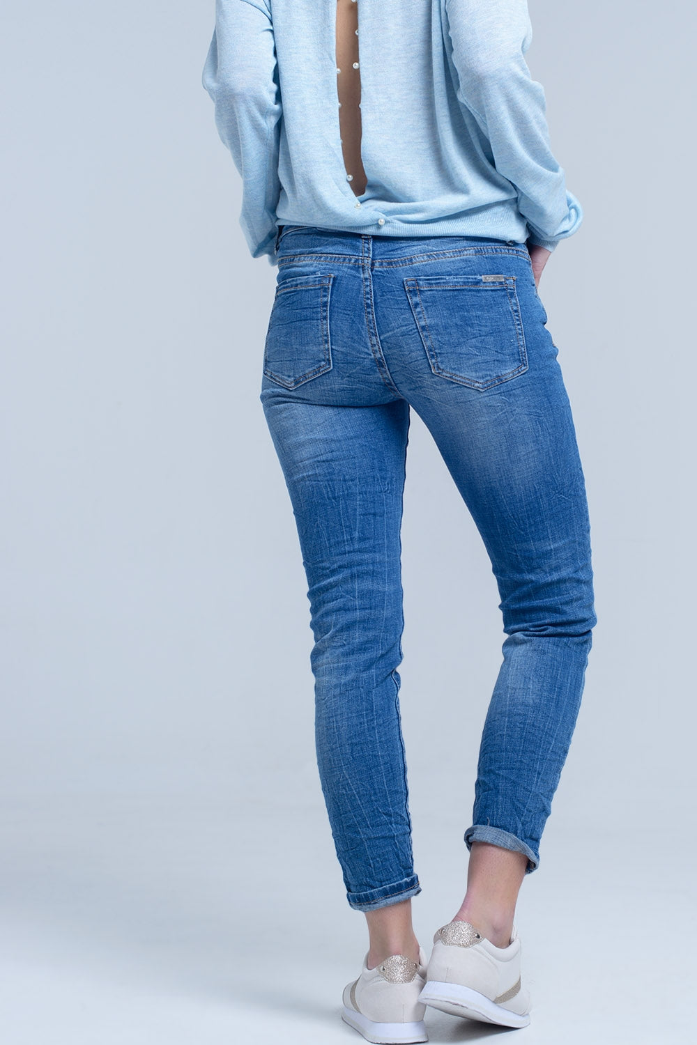 Ankle jeans with rip and repair - Jeans