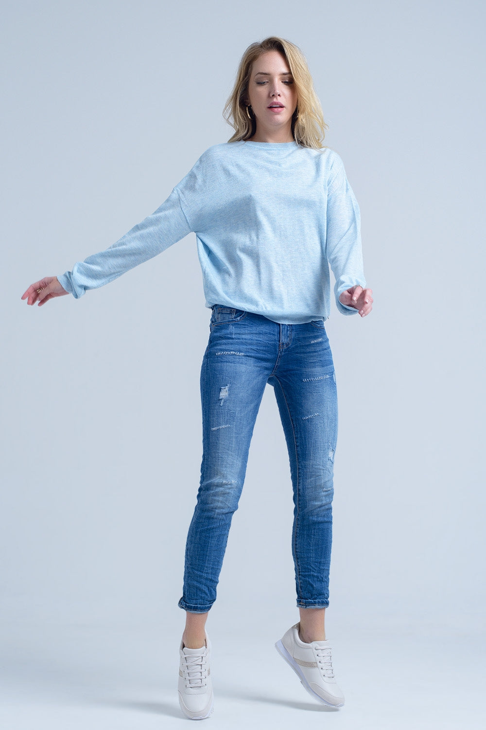 Ankle jeans with rip and repair - Jeans