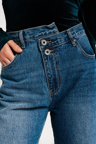 Asymmetric button detail straight jeans in mid blue