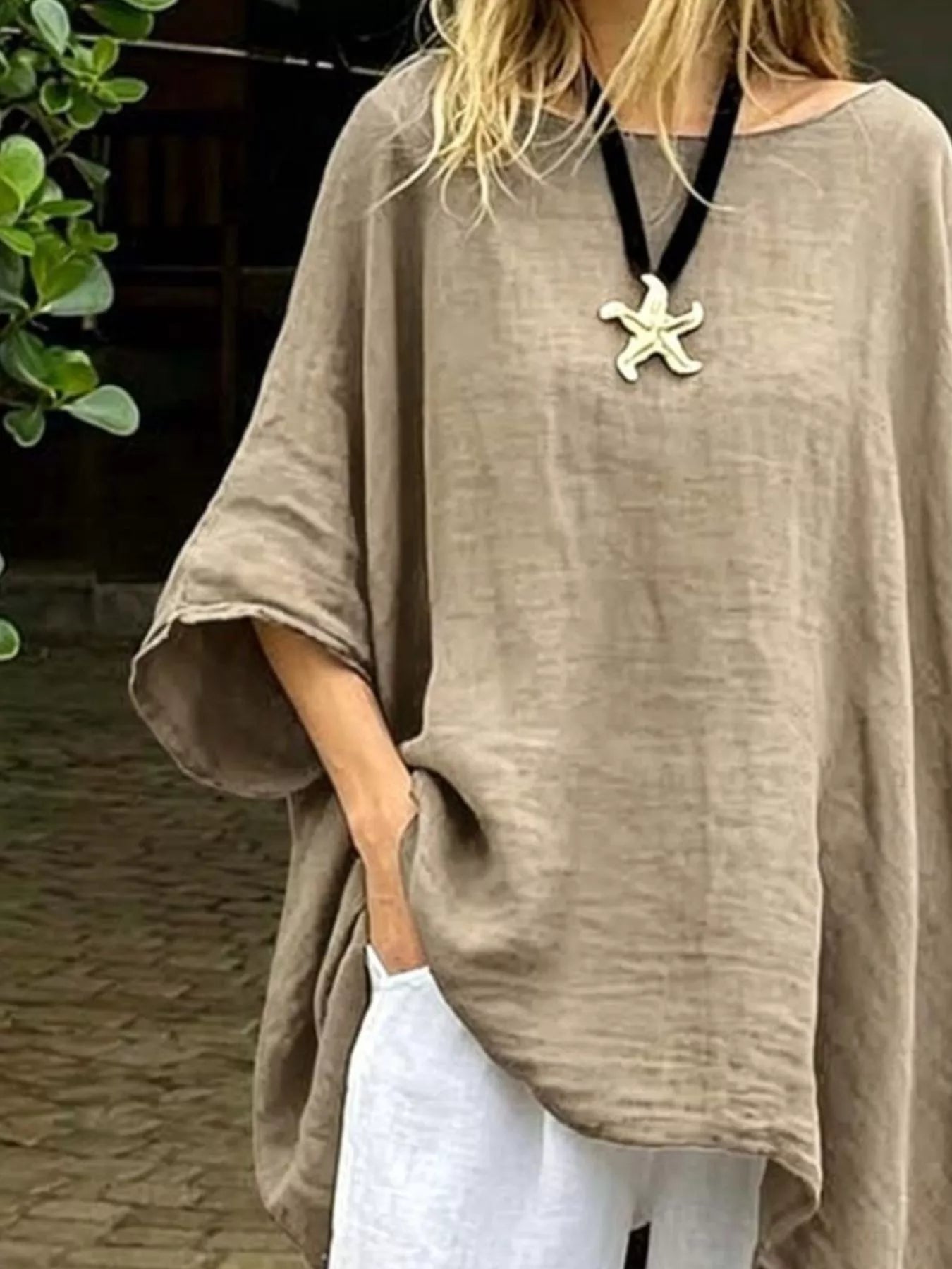 Trendsi asymmetrical hem top in beige, perfect for casual or layered outfits during warmer seasons