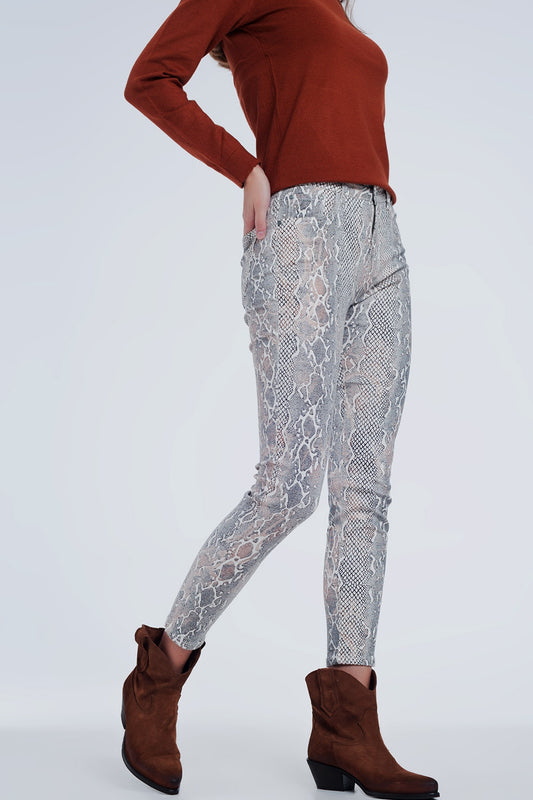 beige coloured pants with snake print - Trousers