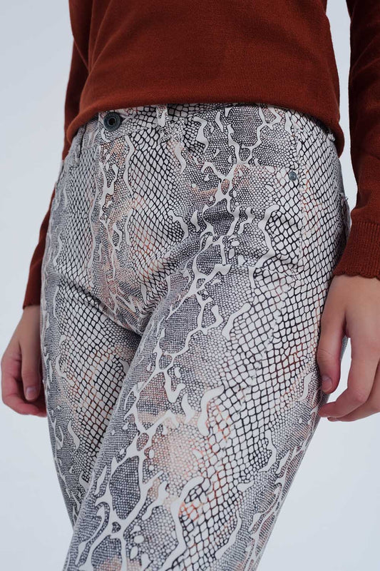 beige coloured pants with snake print - Trousers
