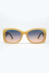 Lunettes de soleil ovales surdimensionnées beiges en acétate