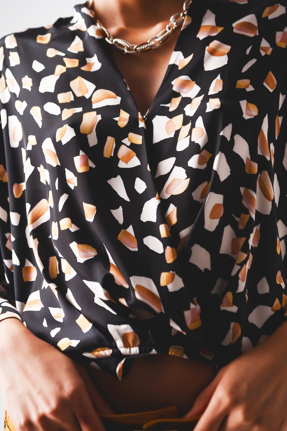 Black blouse with print and wrapped front - Blouses
