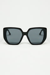 Black pin-up style sunglasses with geometric design and cat eyes