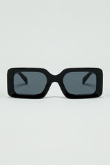 Black square sunglasses with brown animal print on the side