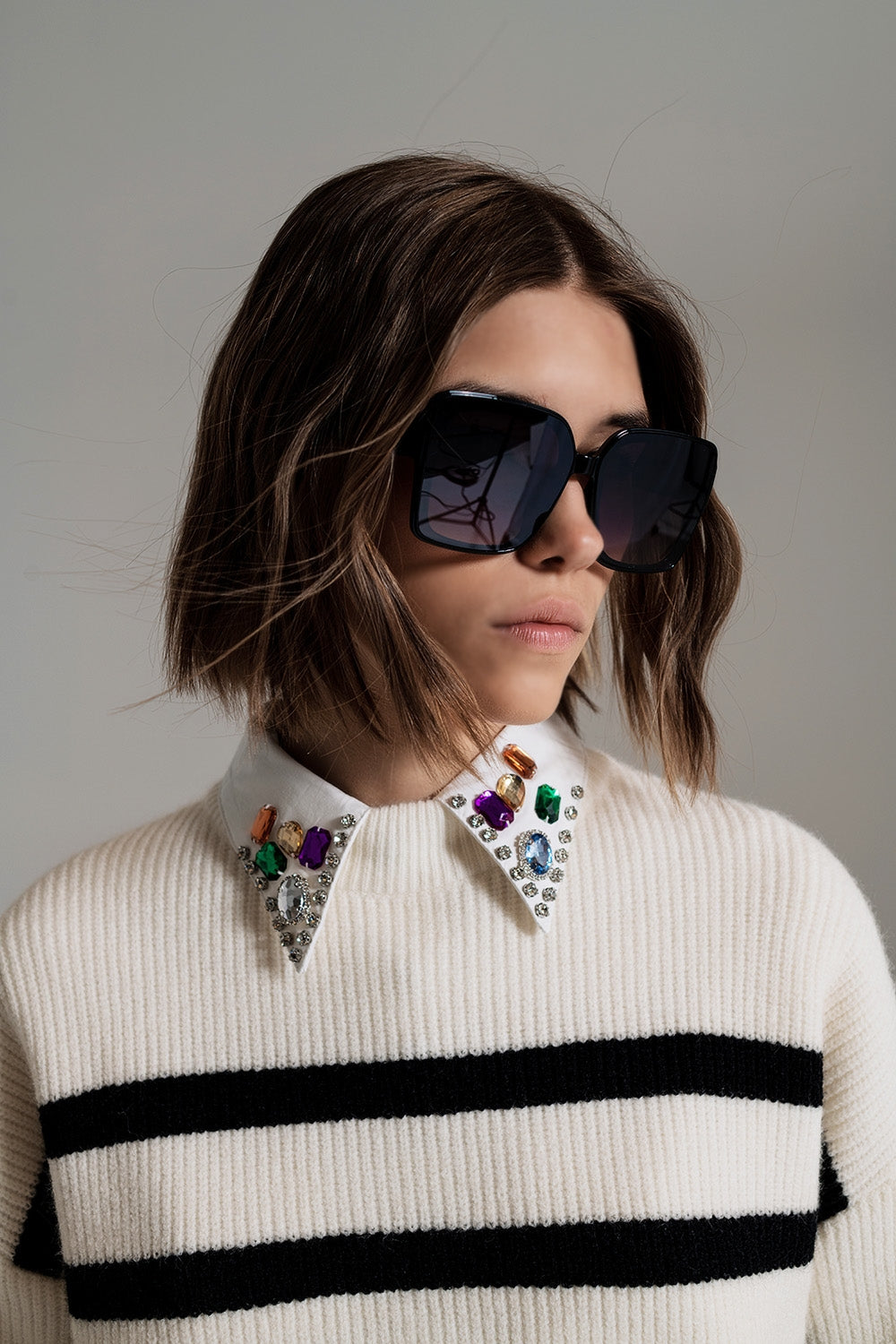 black striped jumper with blue stripe detail on the bottom - Jumpers