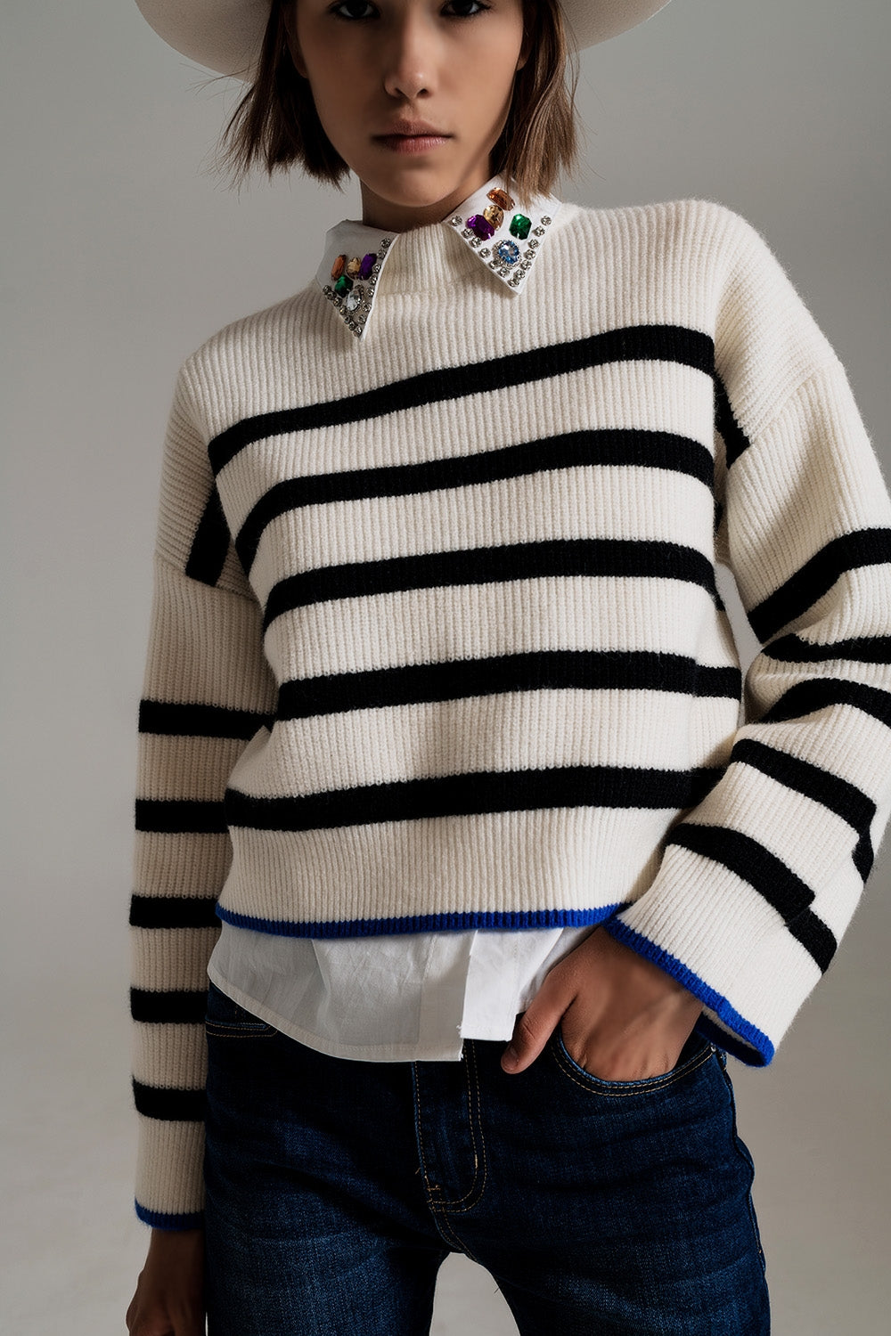 black striped jumper with blue stripe detail on the bottom - Jumpers