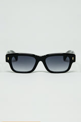 Black sunglasses with oval frame with gold detail