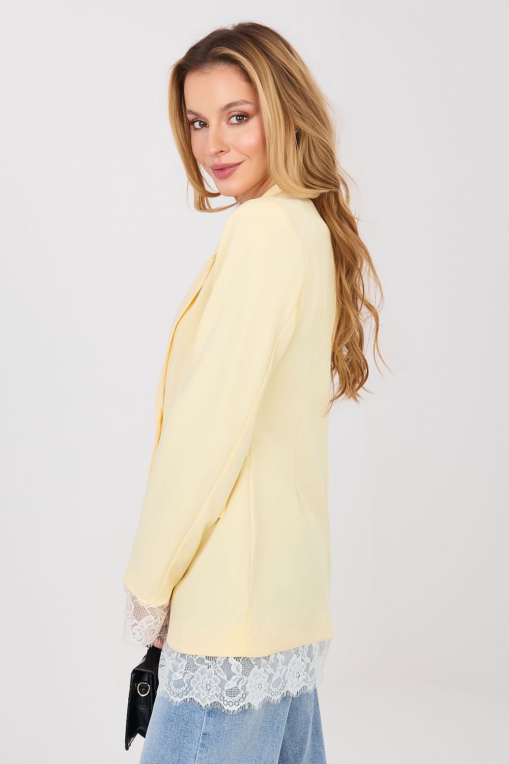 Stylish yellow blazer with lace trim, perfect for smart casual outfits and adding a feminine touch