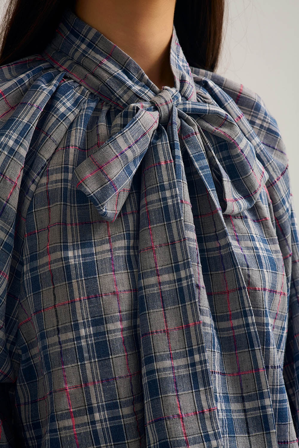 Blue blouse with check print and bow detail at the neck - Blouses