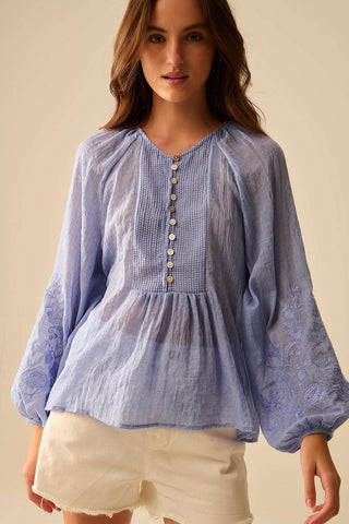 Blue chiffon blouse with embroidery on the sleeves