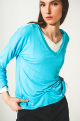 Haut bleu à manches longues et col en V en modal