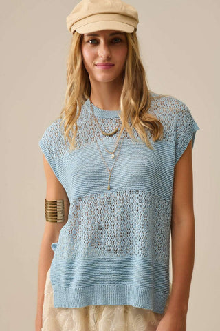 Blue sweater with soft open knit and dropped sleeves