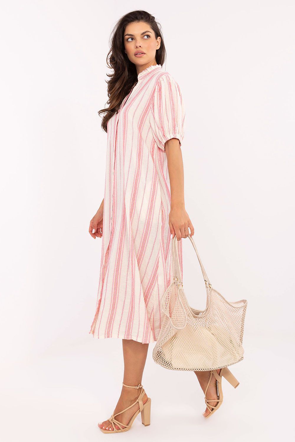 Och Bella Boho style dress in pink and white stripes, paired with a beige tote bag