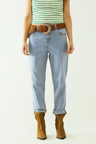 Boyfriend light blue jeans with stitching details on the edges