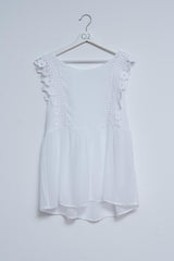 Haut à volants brodés en blanc