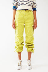 Pantalon cargo avec extrémités à pompons en citron vert