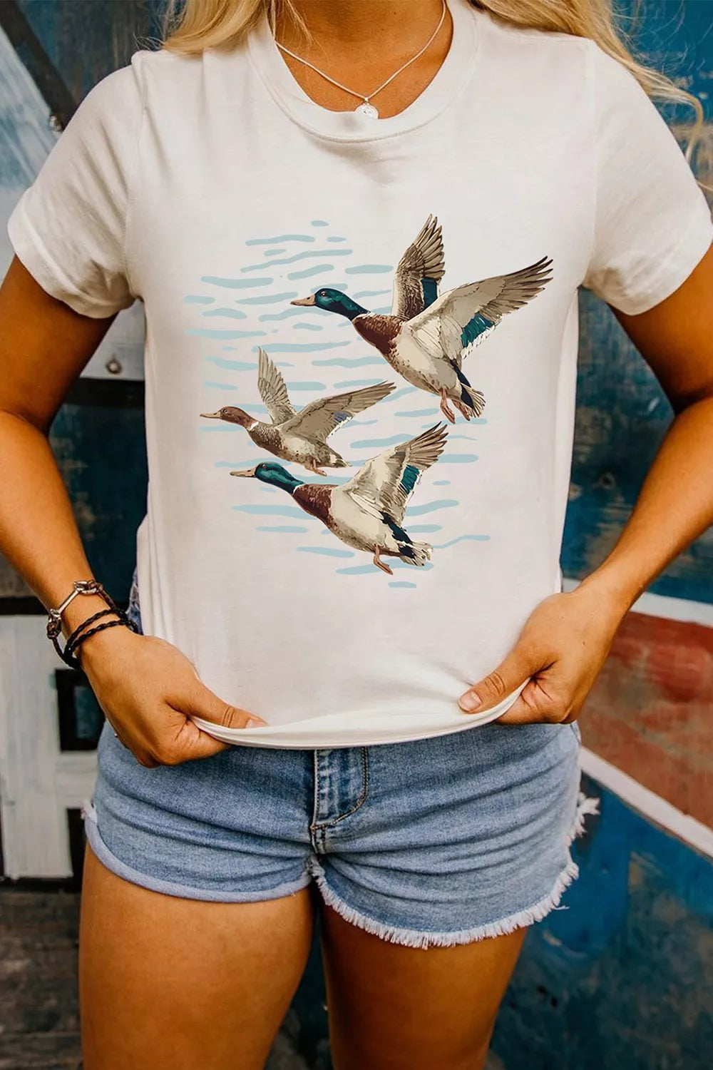Trendsi casual t-shirt plus size featuring a bird graphic with flying ducks and a soft cream background