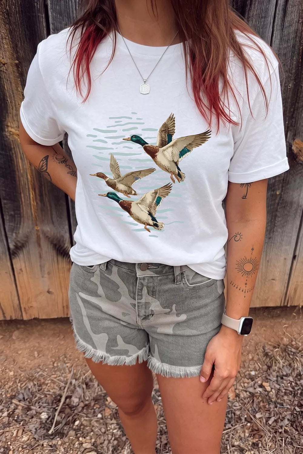 Trendsi casual t-shirt plus size featuring a vibrant duck graphic design on a white background