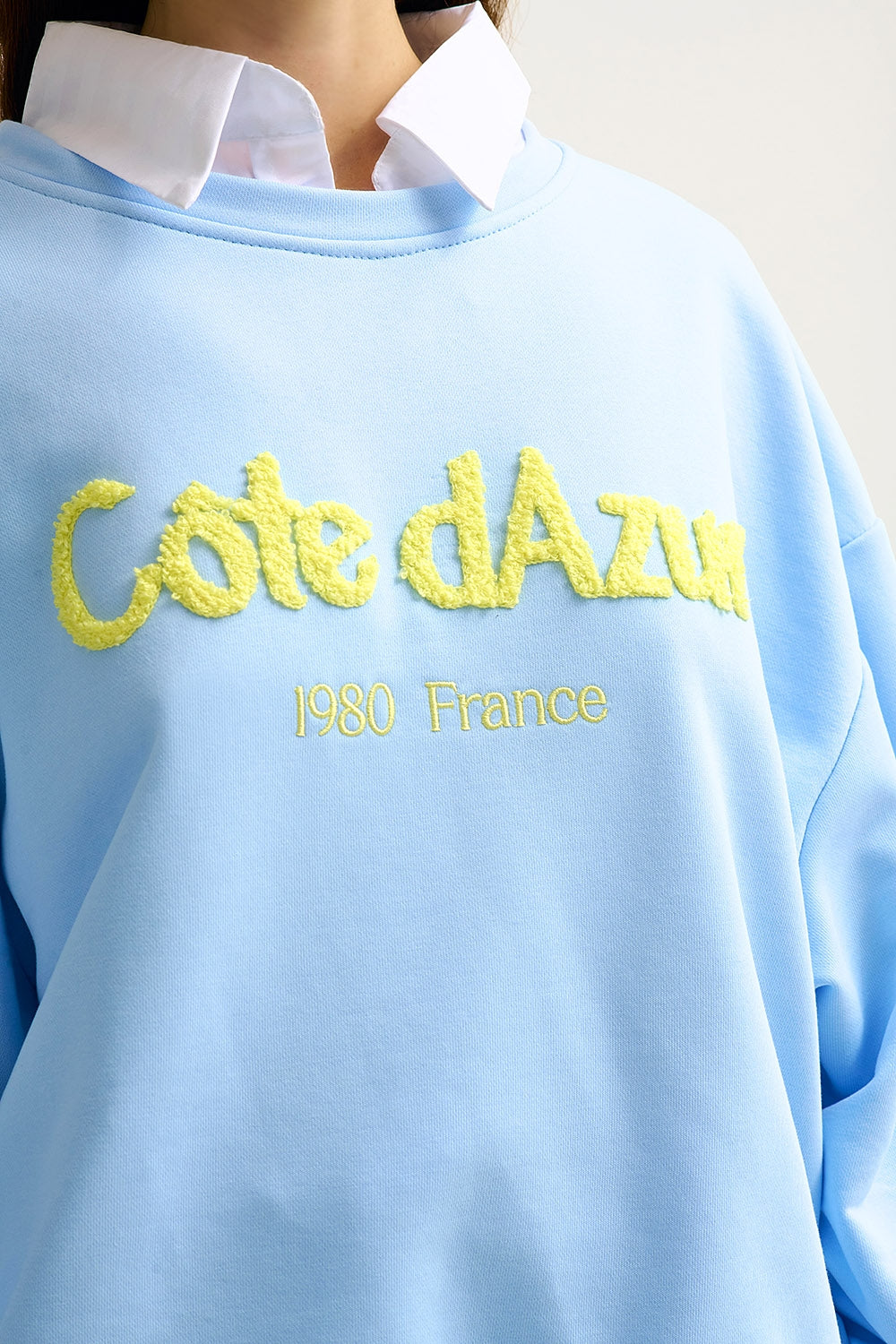 Côte d’Azur Embroidered Pastel Blue Sweatshirt - Sweaters