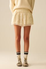 Cream embroidered shorts with sequins
