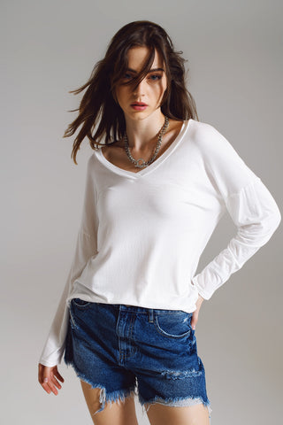 Cream long sleeve v neck top in modal