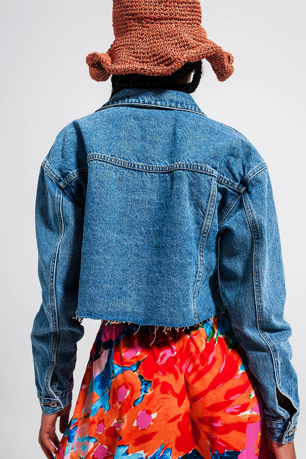 Cropped denim jacket with raw hem in mid wash - Jackets