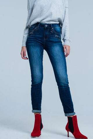 Jeans escuro de cintura alta com detalhes de strass