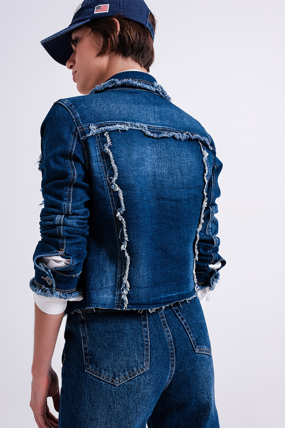Denim jacket with frayed design and unfinished hem - Jackets