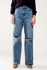 Distressed straight leg jean in medium denim