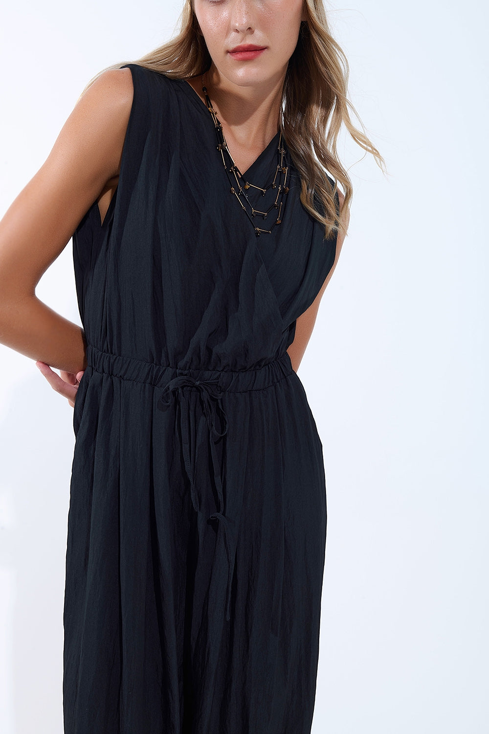 draped black jumpsuit in crinkled fabric - Dresses