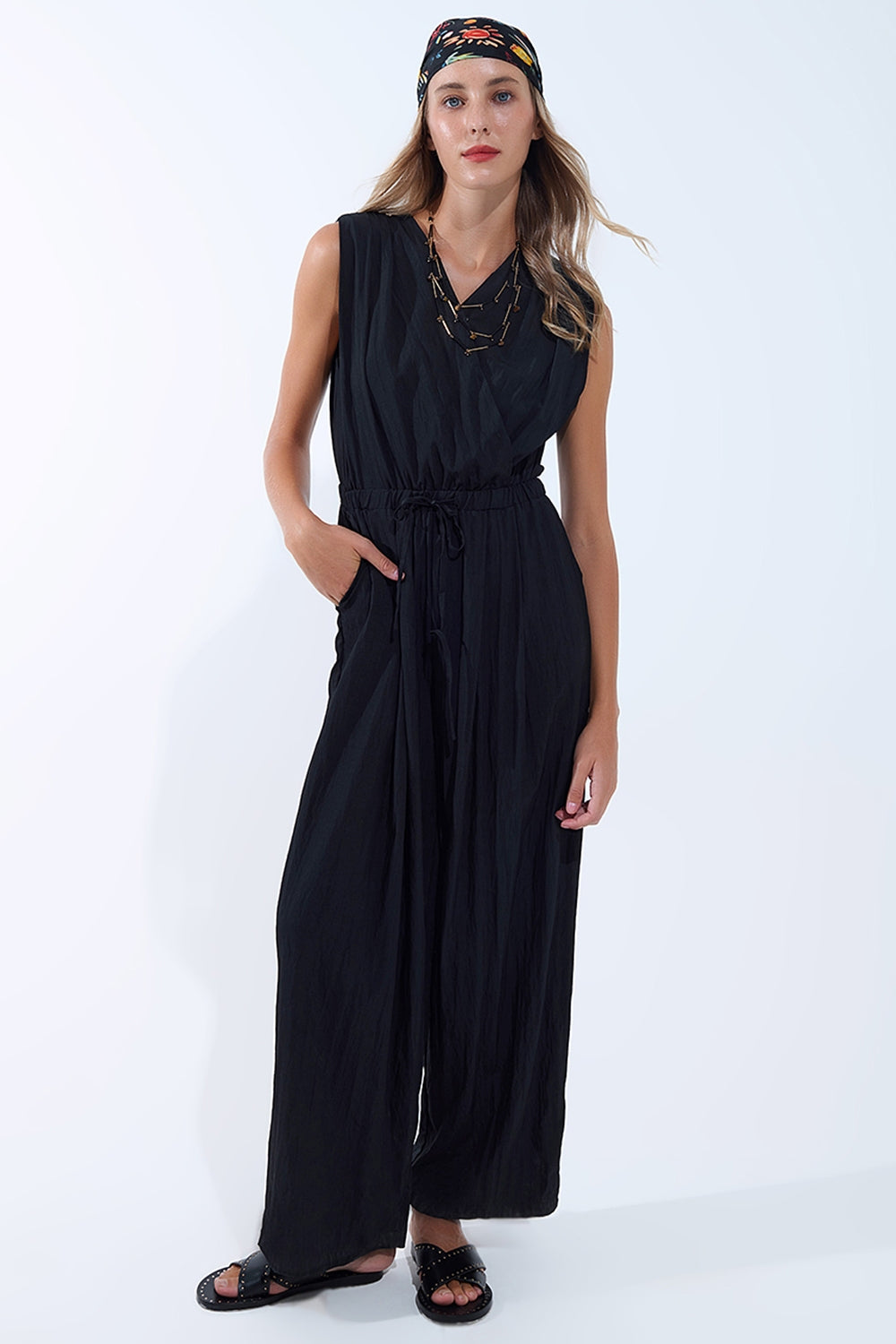 draped black jumpsuit in crinkled fabric - Dresses