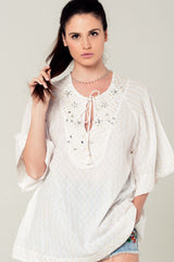 Embellished white mini dress with embroidery detailing