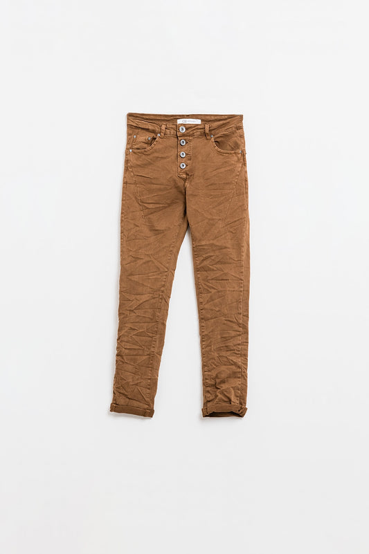 Exposed buttons skinny jeans in brown - Jeans