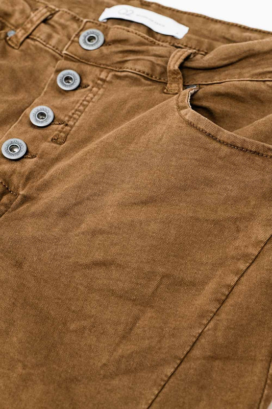 Exposed buttons skinny jeans in brown - Jeans