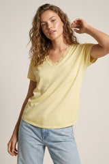 Fine and soft knit sweater with V-neck and lace trim in yellow