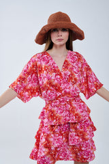Robe à imprimé floral aux tons rose, orange et rouge