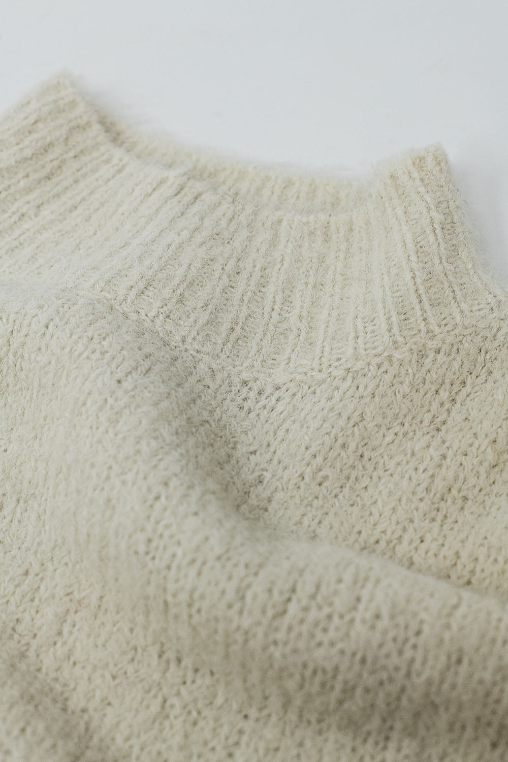 Fluffy beige sweater with high neck and balloon sleeves - Jumpers