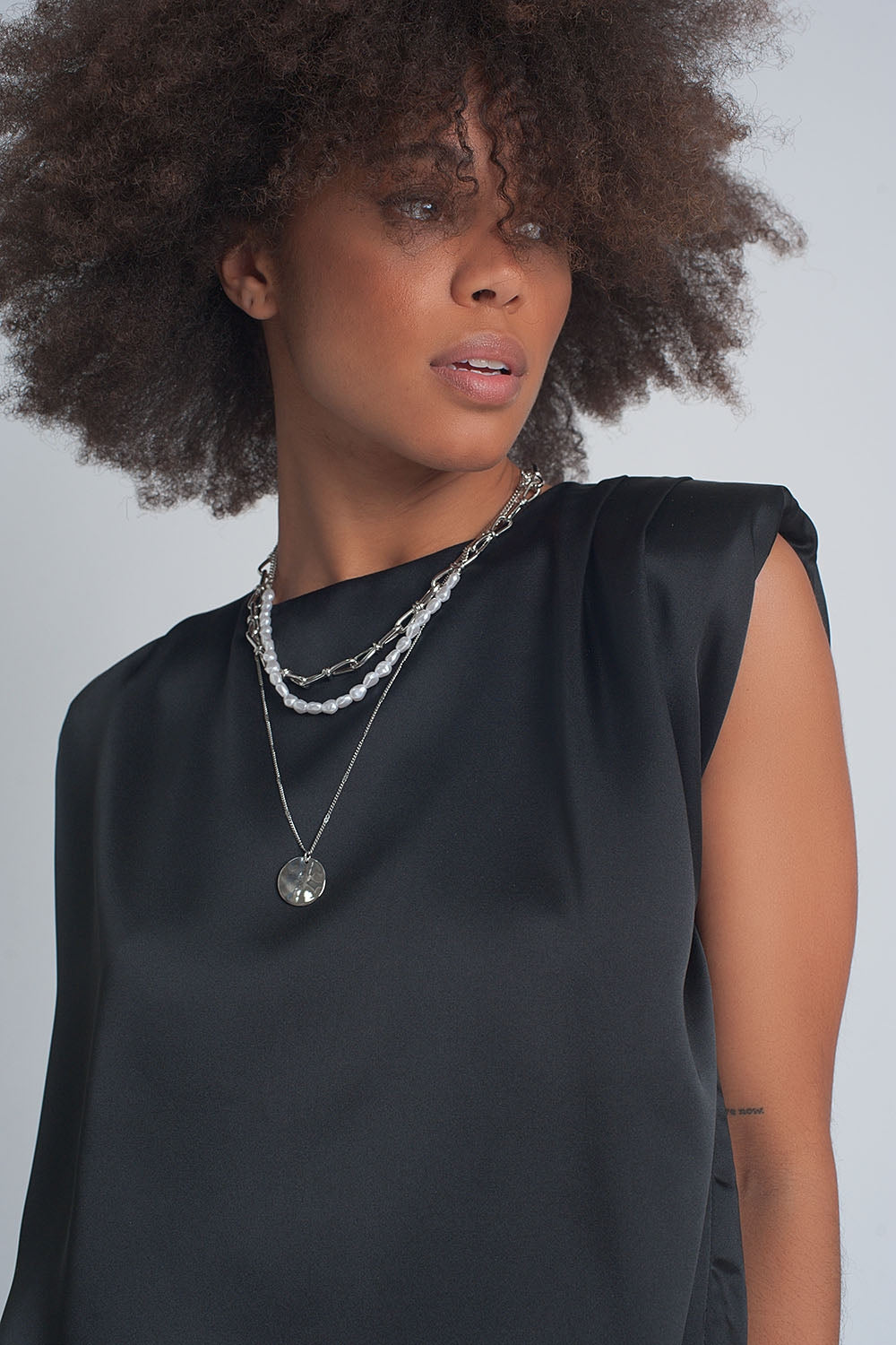 Gathered satin shoulder pad sleeveless top in black - Tops