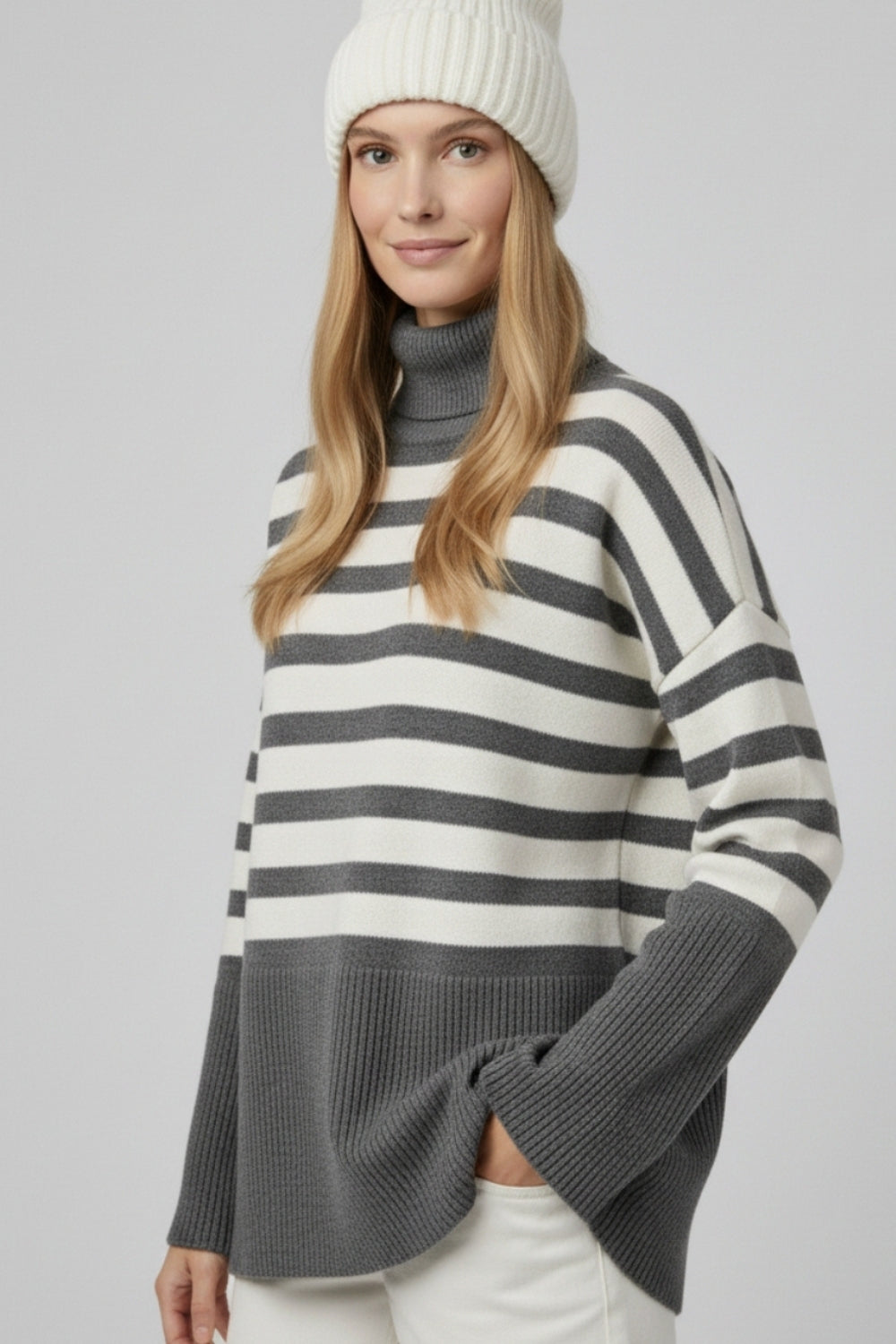 Gray oversized turtleneck sweater with white stripes and splits on the side -