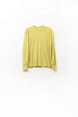 haut en dentelle verte avec col haut et détails de poignets