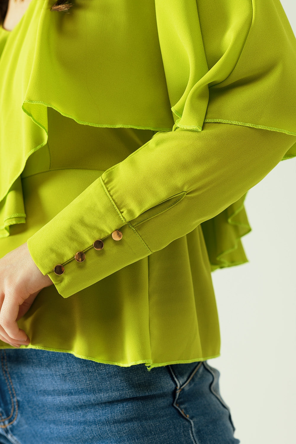 Green long sleeve top with a ruffle detail and bare back - Tops