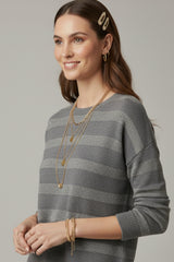 Camisola de malha listrada cinza com detalhes em lantejoulas