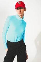 Haut à manches longues et col montant en modal bleu