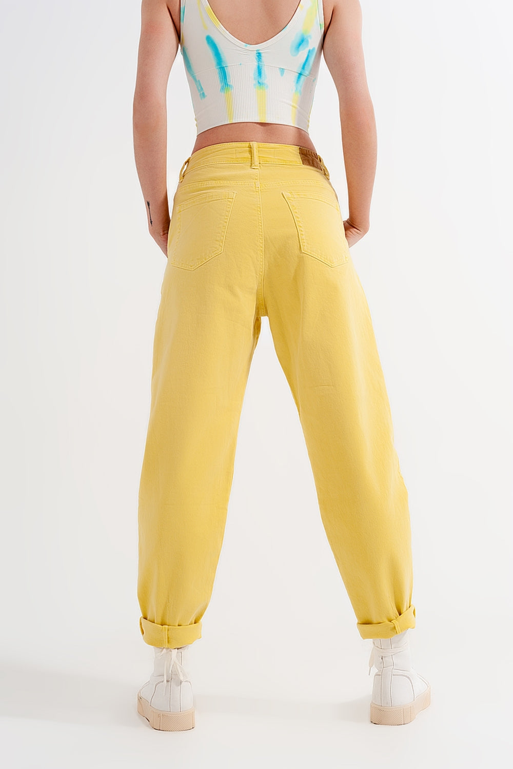 High rise mom jeans with pleat front in yellow - Jeans