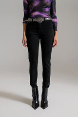 Jeans skinny de cintura alta com bainha desgastada em preto