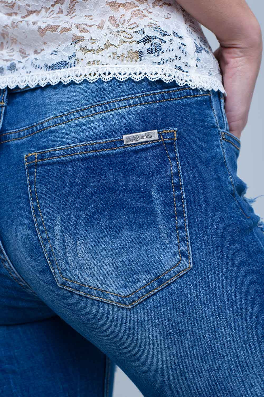 Jean with shredded rips and raw-cut cuffs - Jeans