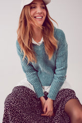 Pull en chenille tricoté en vert